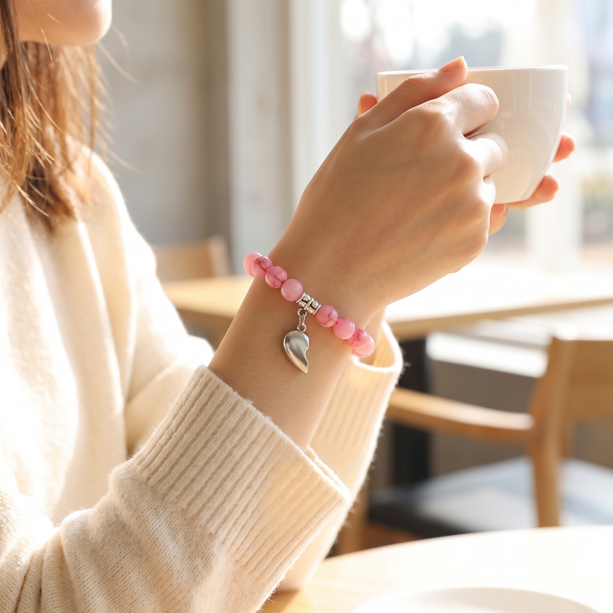 Pink Magnetic Hearts bracelet worn by her